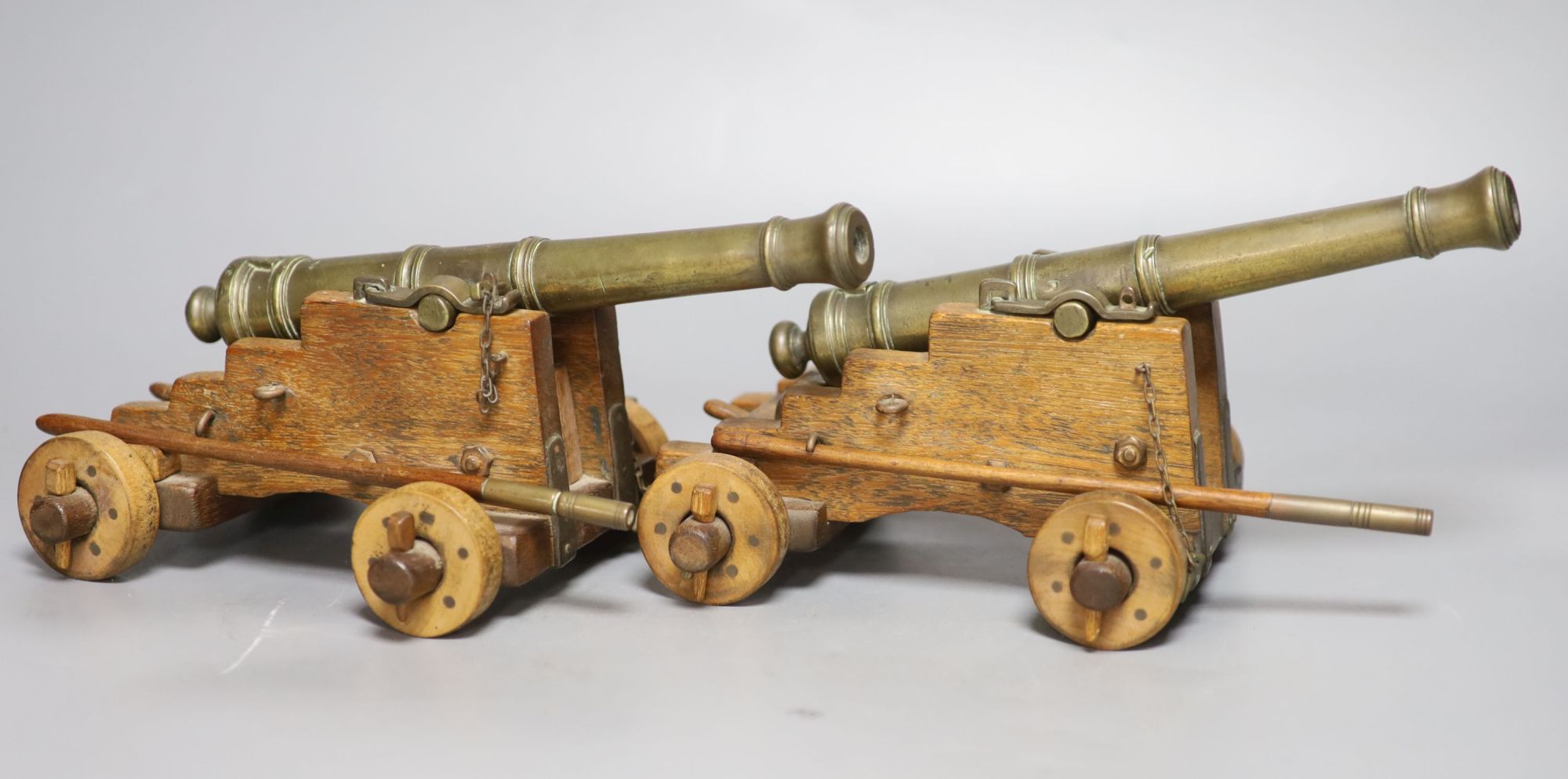 A pair of late 19th century bronze signal cannons, length 26cm